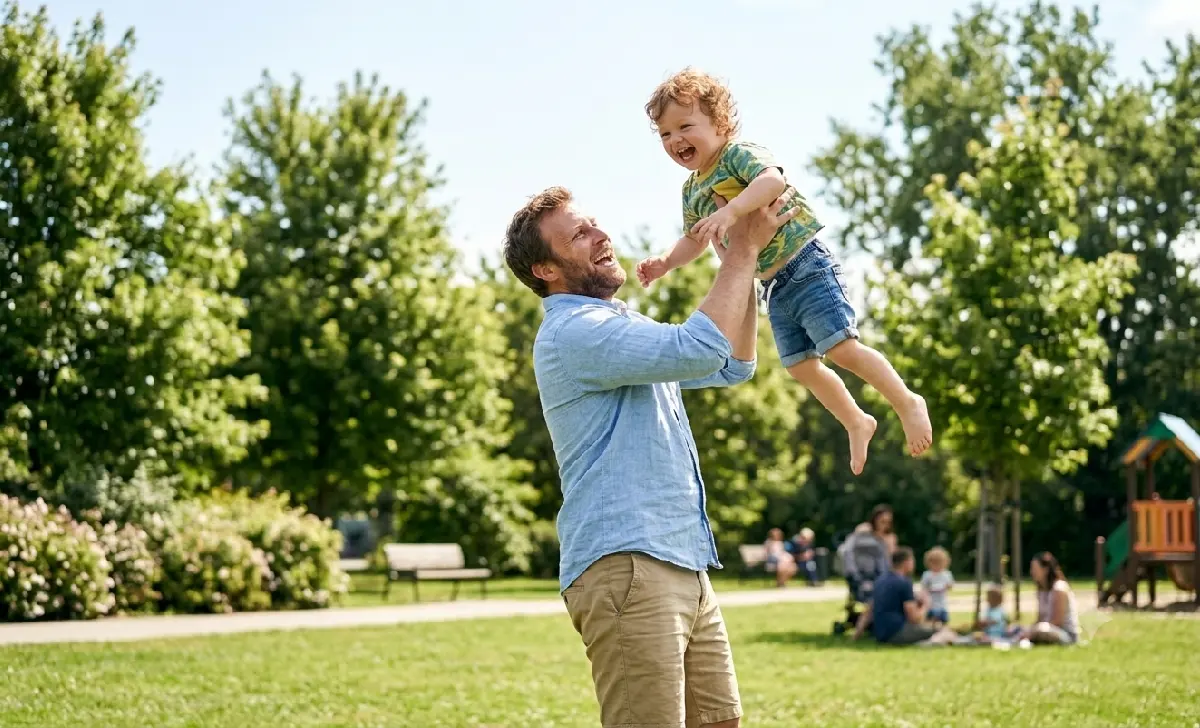 Energetic father playing with child after addressing low testosterone